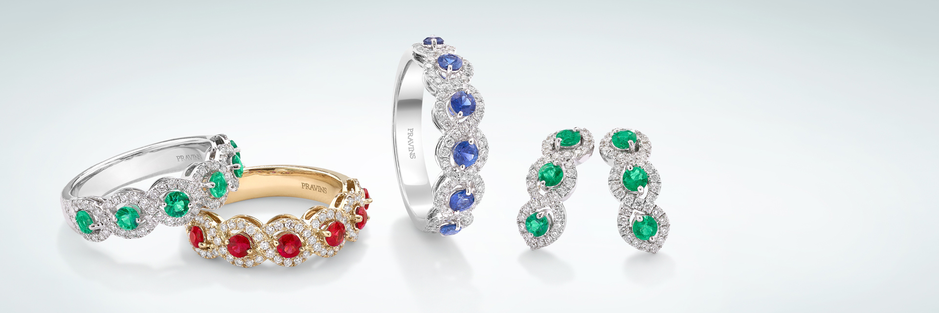 GRACEFUL FLOWING LINES MEET OPULENT COLOURED GEMSTONES