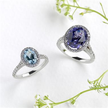 Platinum Oval Aquamarine and Diamond Halo Dress Ring thumbnail