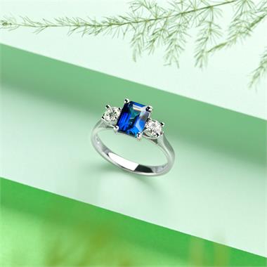 Platinum Emerald Cut Sapphire and Diamond Three Stone Engagement Ring thumbnail