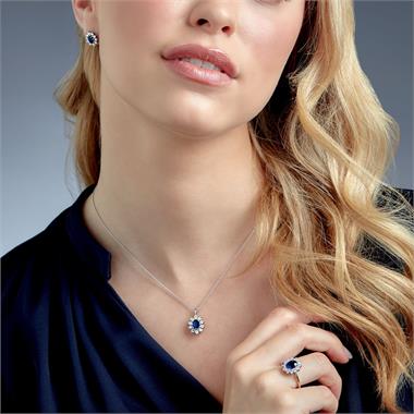 18ct White Gold Oval Sapphire and Diamond Cluster Pendant thumbnail