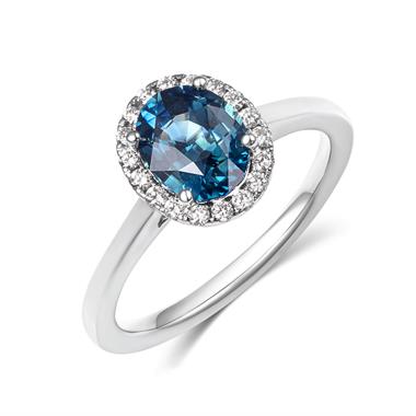 Platinum Oval Teal Sapphire and Diamond Halo Engagement Ring thumbnail 