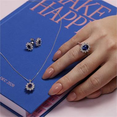 18ct White Gold Oval Sapphire and Diamond Cluster Engagement Ring thumbnail