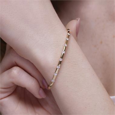 Astra 18ct Yellow Gold Diamond Bangle thumbnail