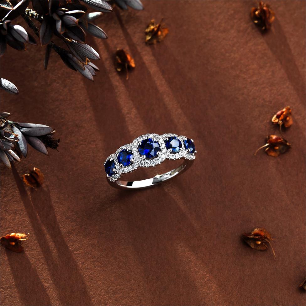 18ct White Gold Sapphire and Diamond Halo Dress Ring Thumbnail Image 1