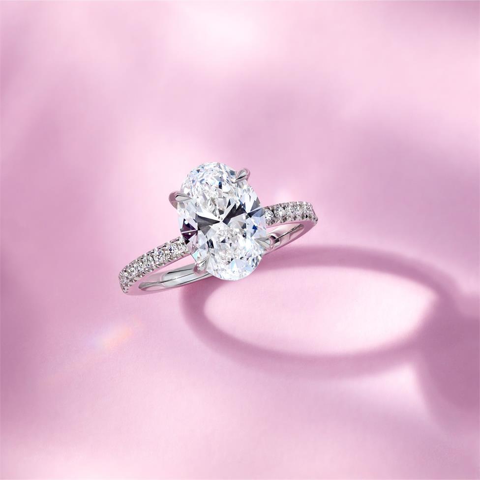 Platinum Hidden Halo Oval Diamond Solitaire Engagement Ring Thumbnail Image 1
