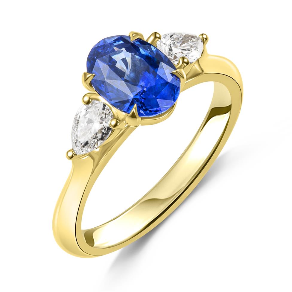 18ct Yellow Gold Blue Sapphire Three Stone Ring Thumbnail Image 0